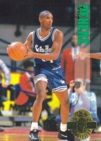 Former Seton Hall Pirate Terry Dehere looks to pass the ball during a college basketball game.