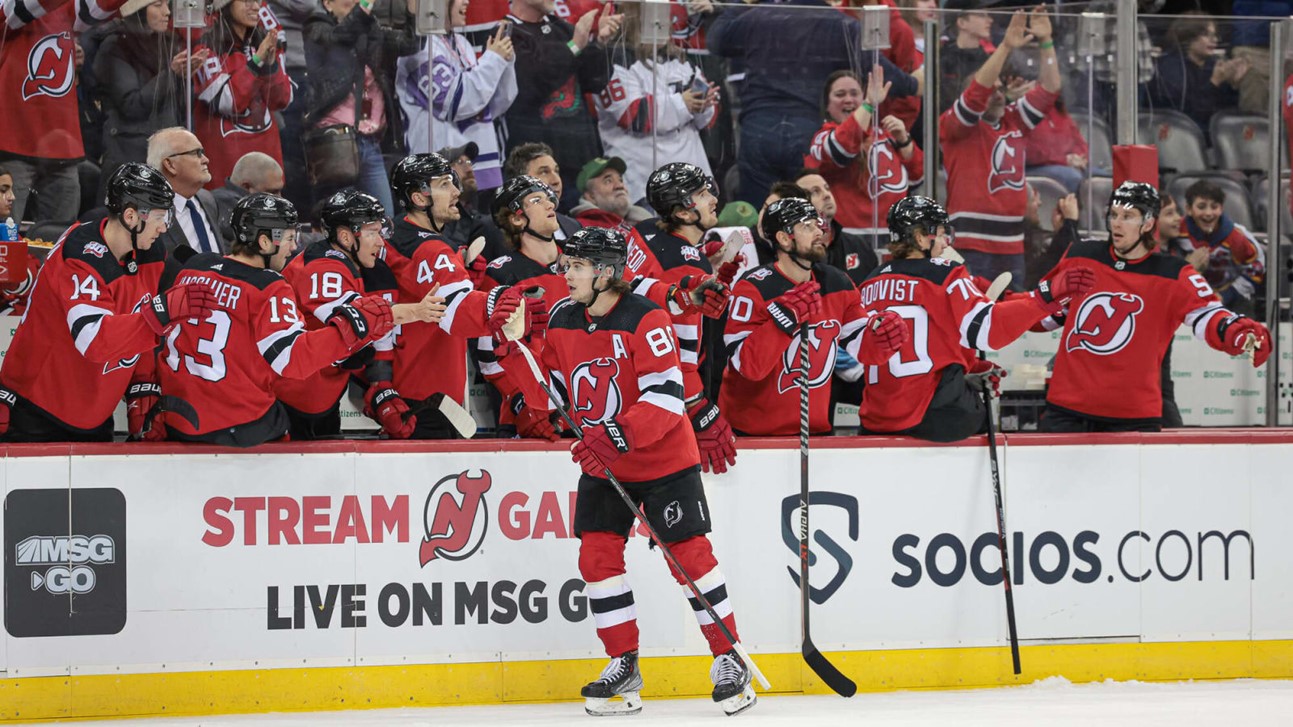 The Devils celebrate a huge win vs the Hurricanes.