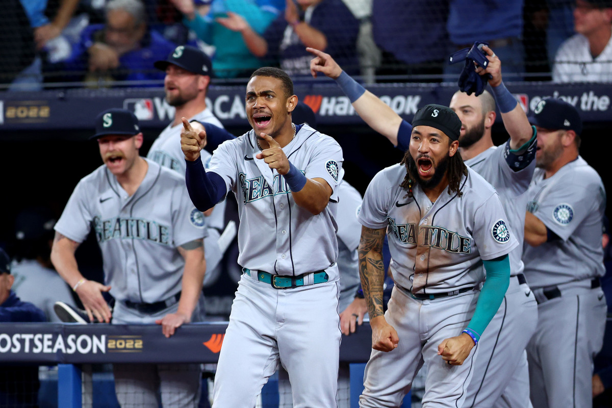 The Mariners celebrate in disbelief as they take down the Blue Jays after an improbable comeback.
