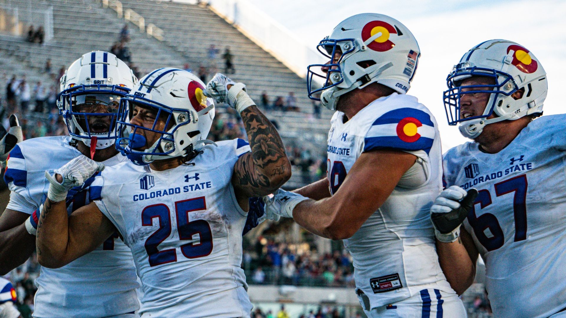 The Rams celebrate in their new uniforms inspired by the Colorado state flag.