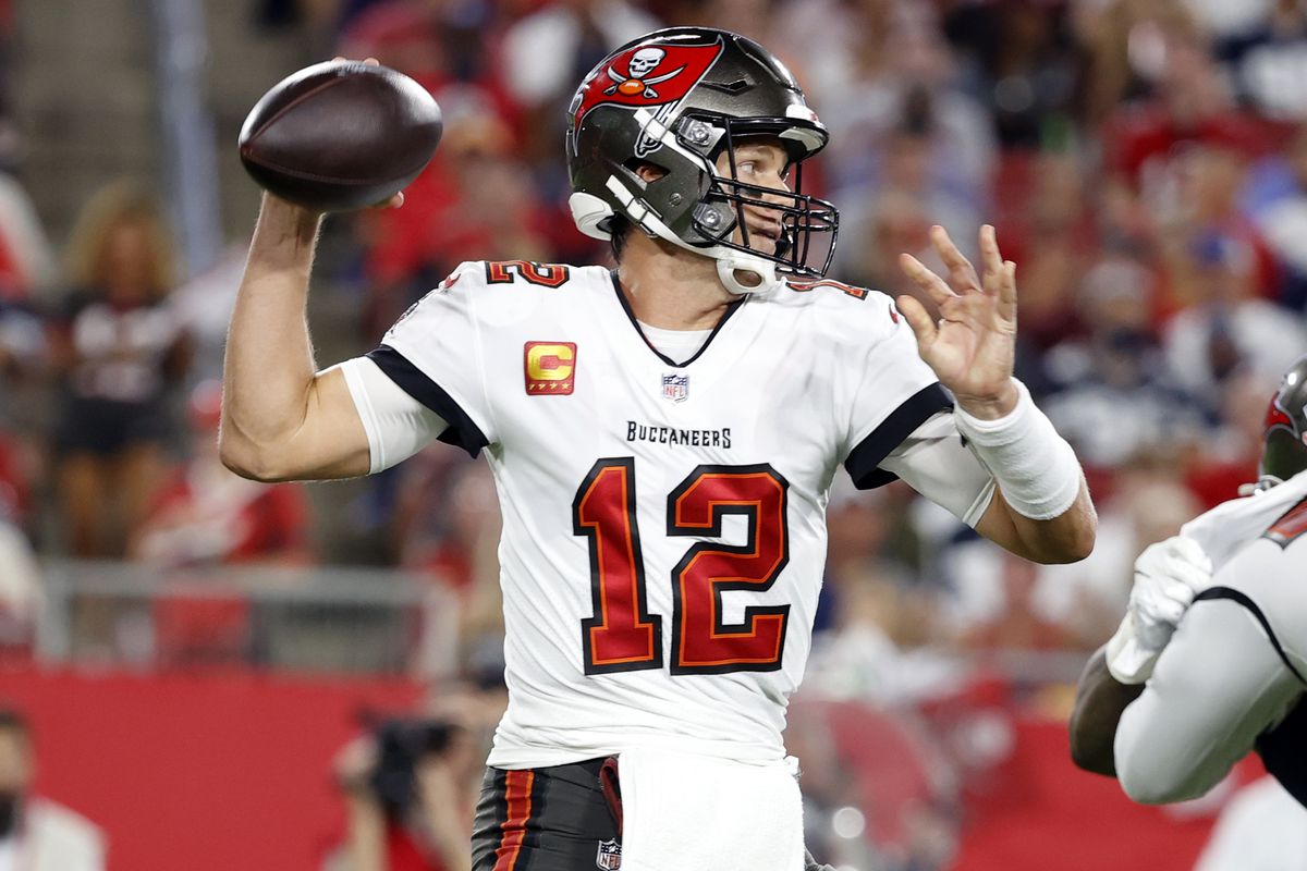 Tom Brady tries to throw a pass during a Tampa Bay NFL game.