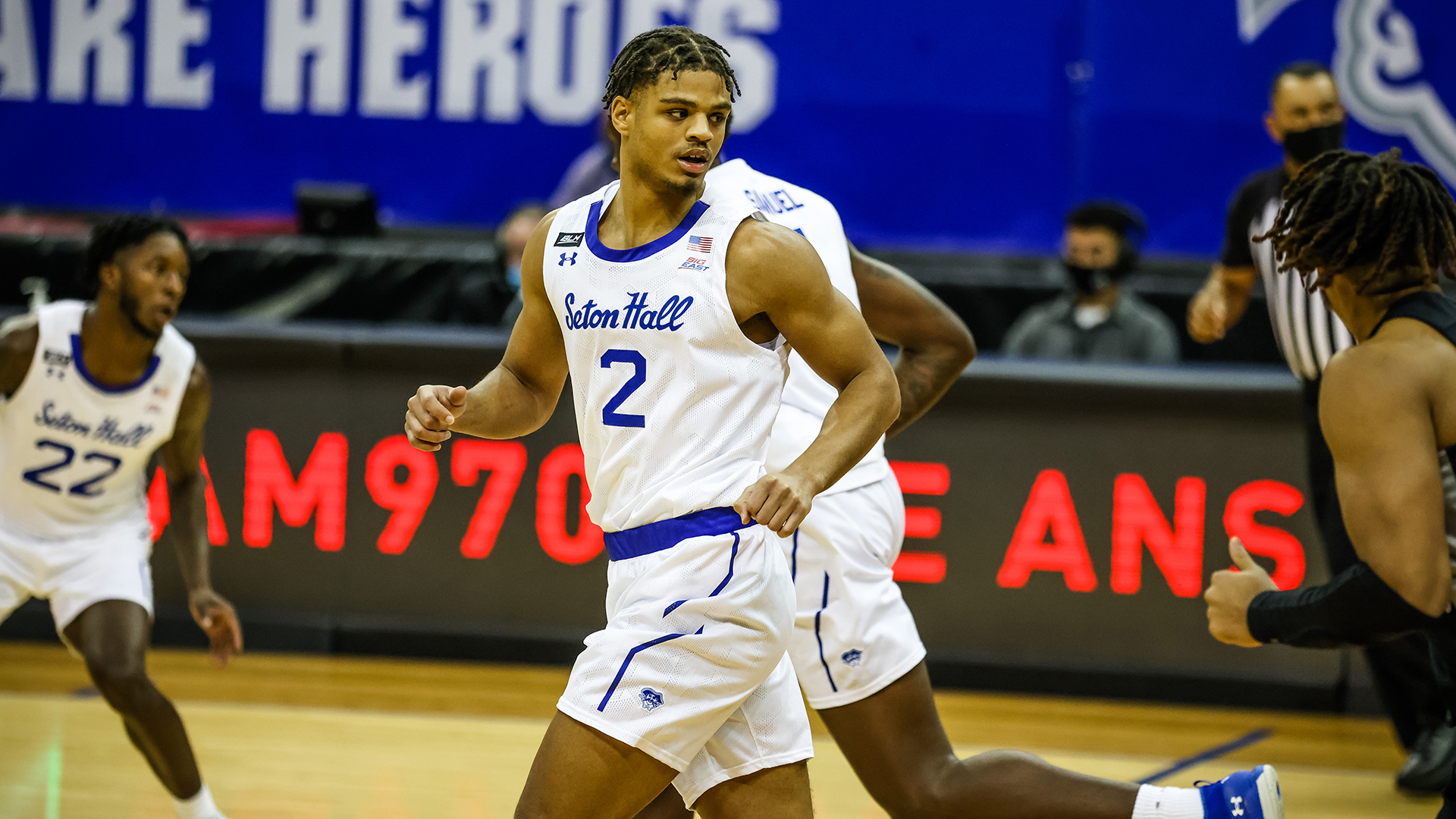 Seton Hall's Tray Jackson runs down the court during a Pirates' basketball game.