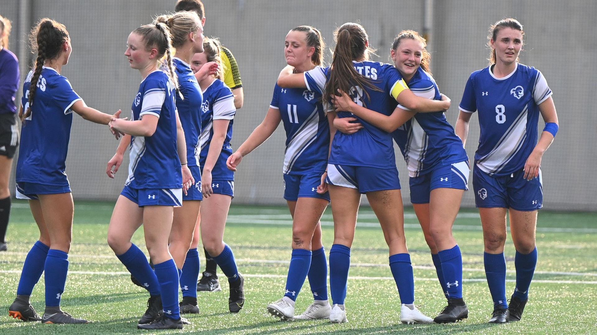 The Seton Hall women's soccer team celebrates after their third straight victory.