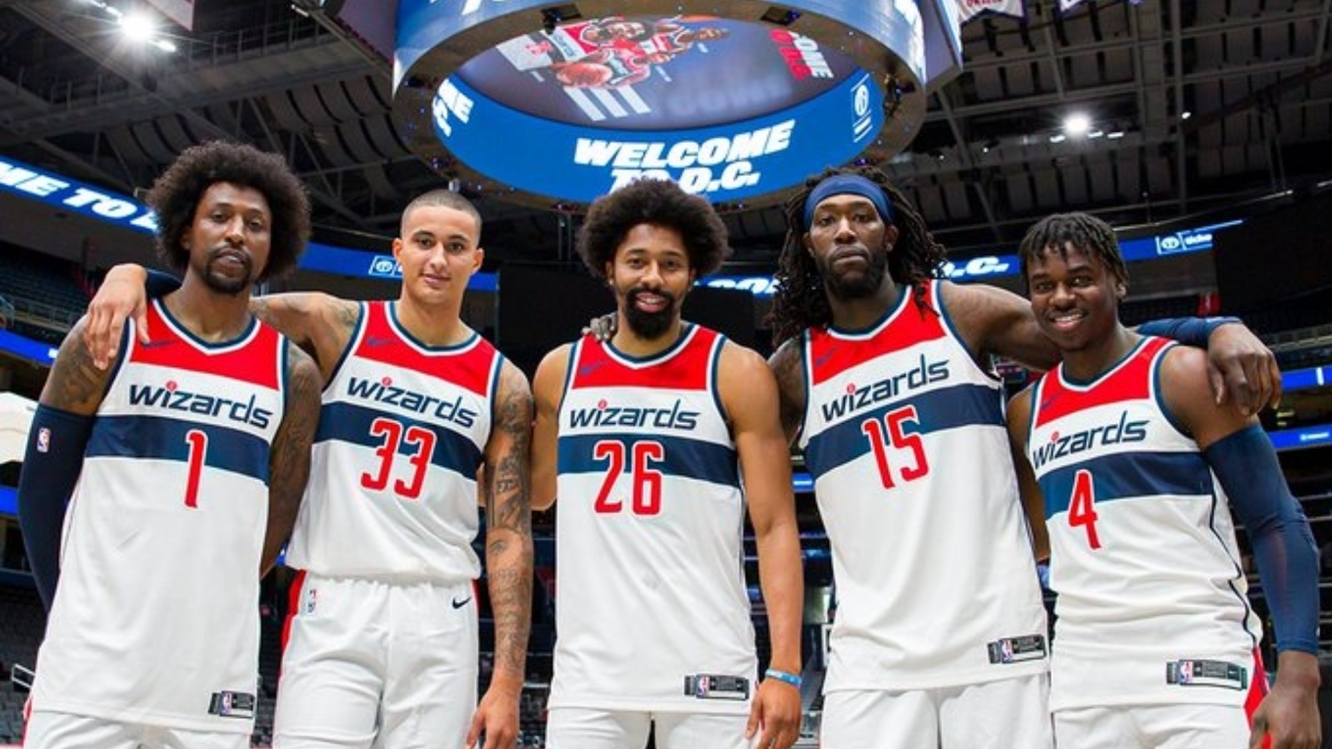 Five Washington Wizards teammates pose for a photo.