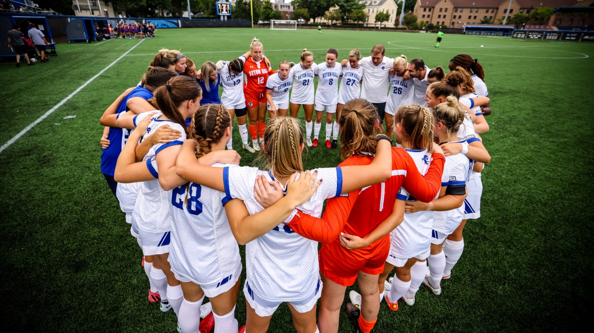 Pirates huddle together before a game.